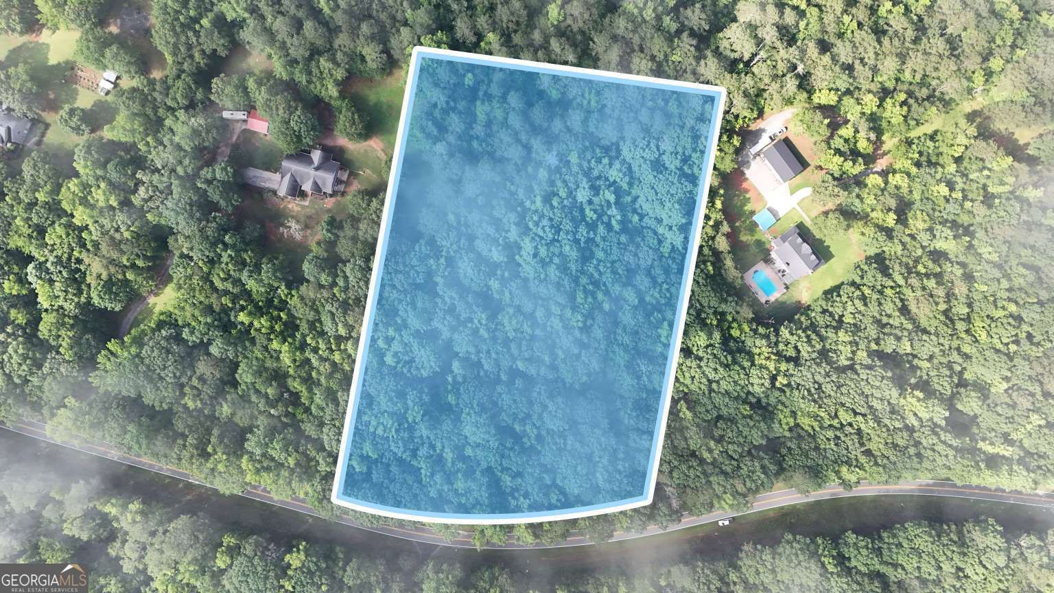 This expansive 5.05-acre lot in Social Circle, GA, offers an excellent opportunity for residential development or a private estate. Located on Hawkins Academy Rd, the property is easily accessible with paved road frontage and is situated in a peaceful, rural setting with plenty of privacy. The lot is level and mostly cleared, providing a perfect location for building a custom home or farm. Social Circle is known for its small-town charm, proximity to Atlanta, and excellent schools, making this a desirable area for both families and investors.