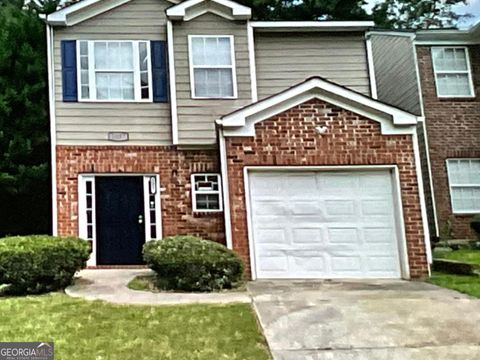Photo of 5057 Windsor Forrest Lane, Atlanta, GA 30349 (MLS # 10537416)