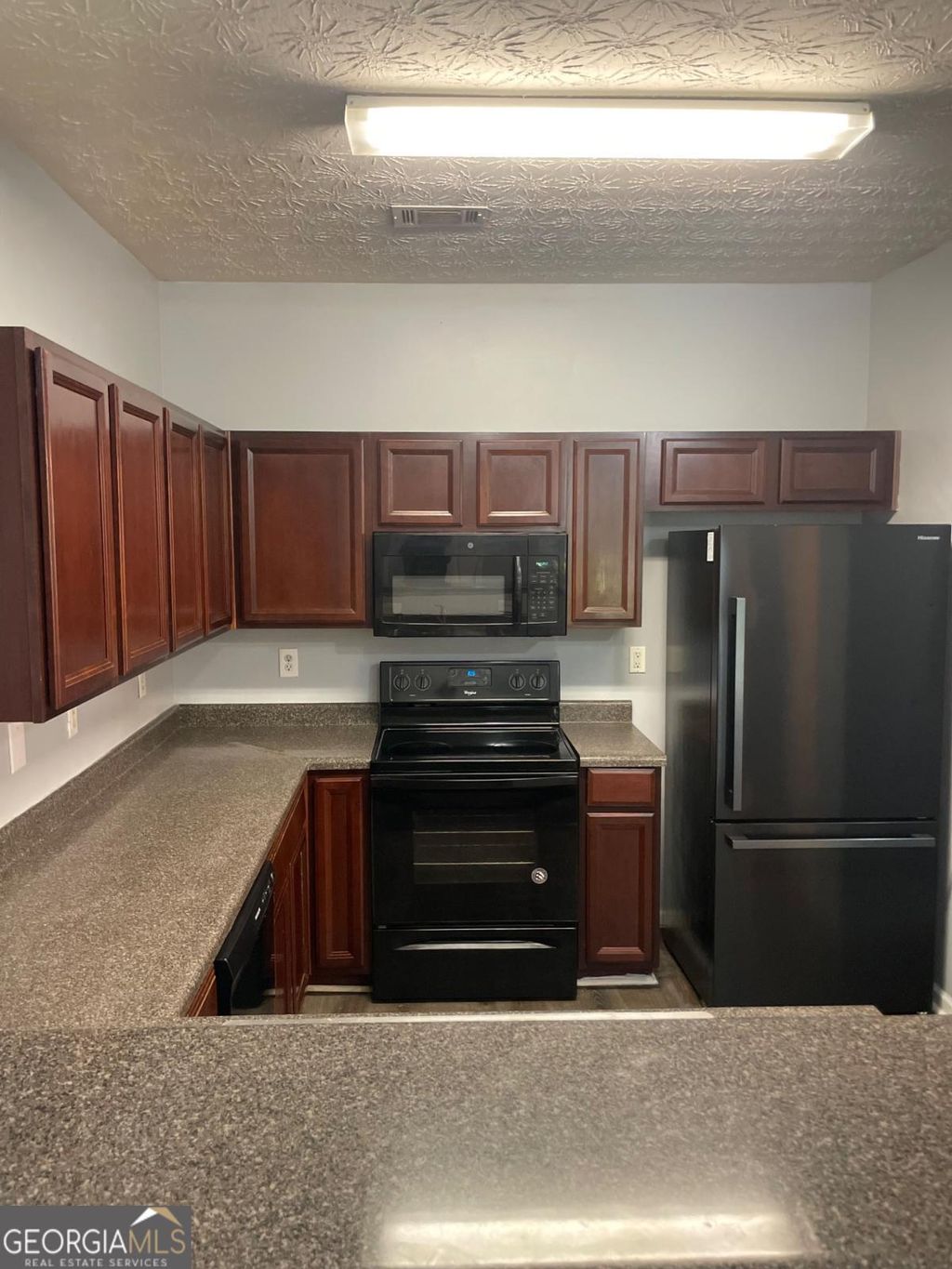 Photo of 6316 Ellenwood Dr, Rex, GA 30273 (MLS # 10793529)