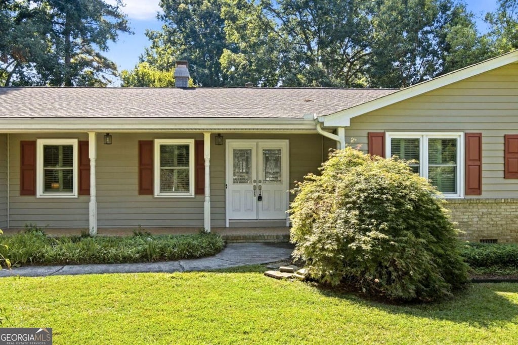 Photo of 56 Bonnie Lane NW, Lilburn, GA 30047 (MLS # 10849290)