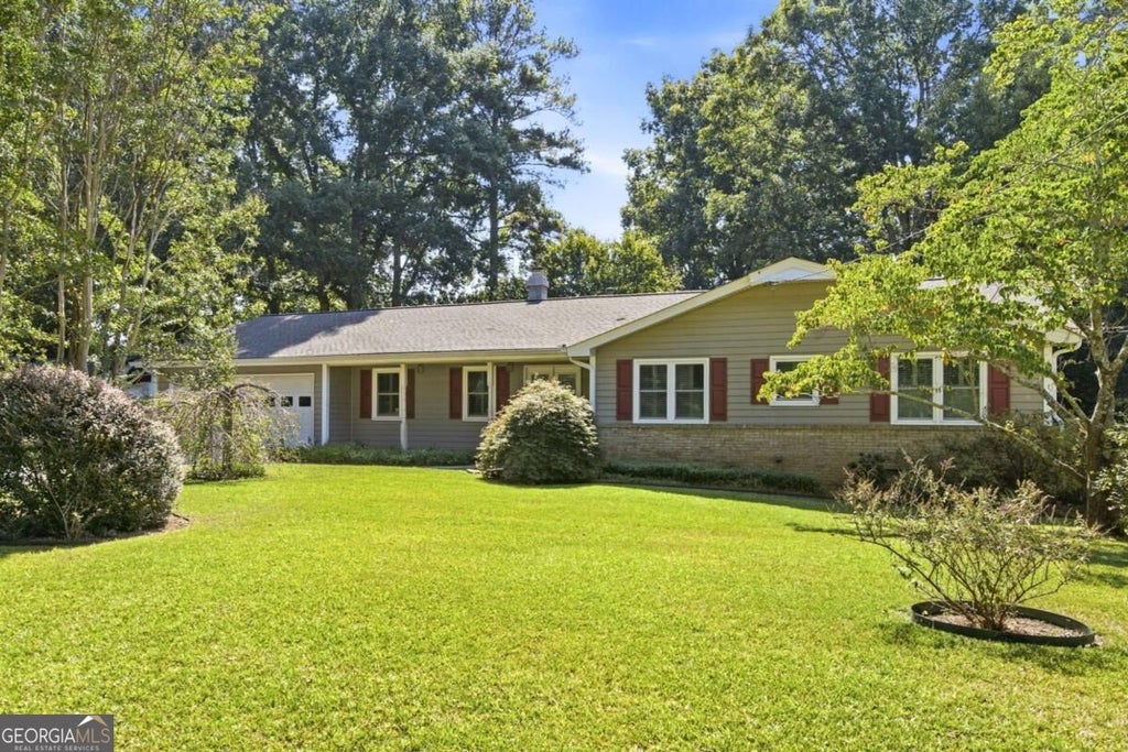 Photo of 56 Bonnie Lane NW, Lilburn, GA 30047 (MLS # 10849290)