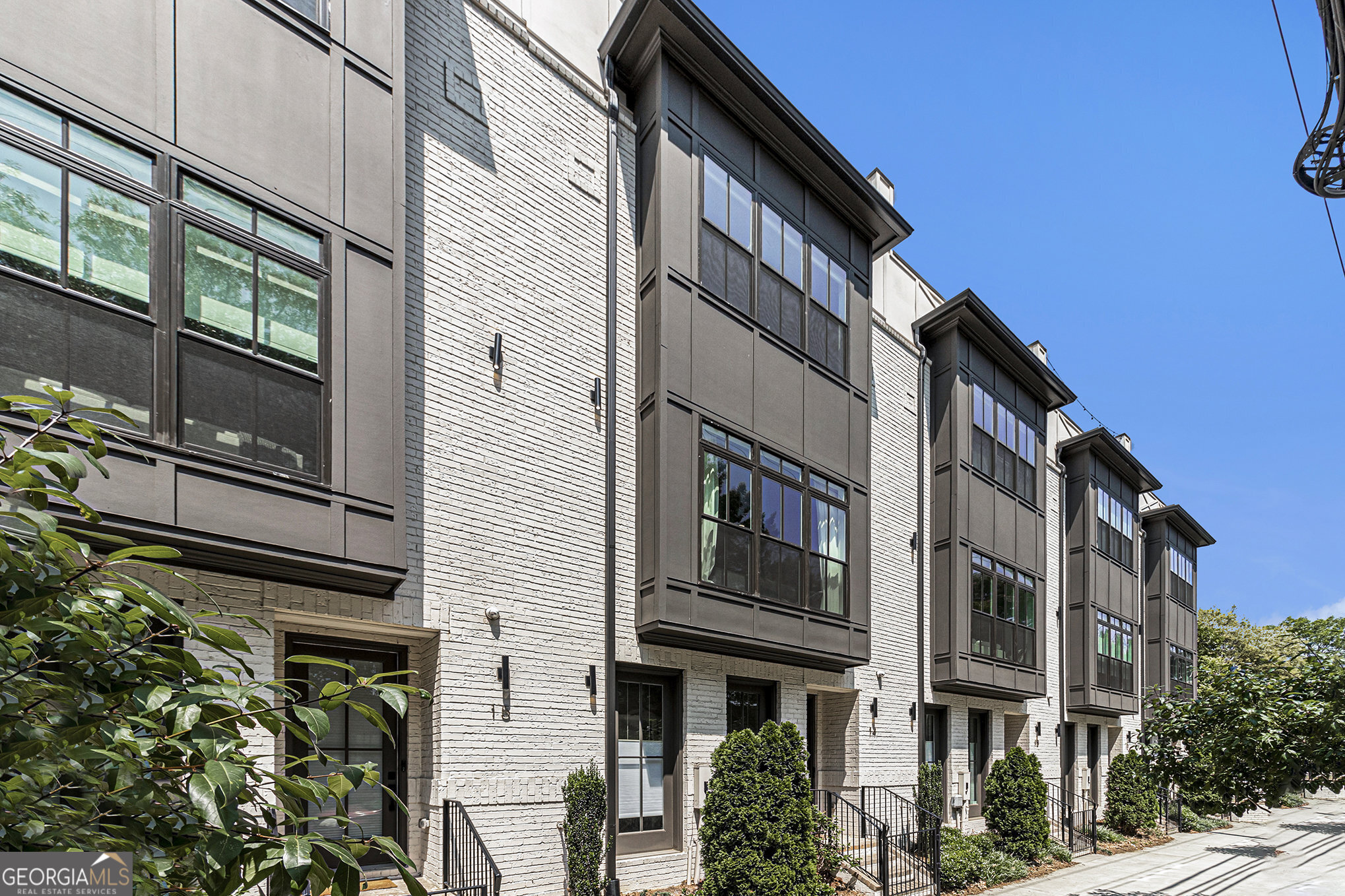 Experience 574 Boulevard Place Unit 14. Managed by EXCALIBUR HOMES. Experience Luxury City Living as it should be. This modern masterpiece is a one-of-kind townhouse featuring hardwood floors, 10-foot ceilings, as well as a **PRIVATE ELEVATOR** BRIGHT and OPEN FLOOR PLAN allows natural light to fill every floor of this home. The terrace level features your first of two secondary bedrooms, which is also a perfect space for a home office, and full bathroom. On your main floor you'll find open concept living with unobstructed views from the designer kitchen to living room with custom floating cabinetry and floor to ceiling windows. An inspiring chef's kitchen featuring commercial grade stainless steel appliances, oversized island with stainless steel farm sink. The PRIMARY SUITE occupies the entire 3rd floor including spa-like bathroom, dressing room, private balcony, and a private bath with freestanding soaking tub, spacious walk-in shower with dual heads, and double vanity featuring LED back-lit mirrors. Upstairs you'll find your remaining secondary bedroom and full bathroom. Enjoy relaxing sunsets from your PRIVATE ROOFTOP DECK. Off-street parking available in your 2 car garage. Located less than 3 minutes from PONCE CITY MARKET, groceries, shopping, dining and entertainment. Close to the BELTLINE, Piedmont Park, and minutes from Downtown Atlanta and Midtown. Easy access to Ponce De Leon Avenue, North Avenue, I-75/85 (the downtown connector) and I-20. Apply Today!! Start Living the Dream Tomorrow!!! Excalibur Homes does not advertise on Facebook or Craigslist. Be advised that the sq ft and other features provided may be approximate. Prices and/or availability dates may change without notice. Lease terms 12 months or longer. Application fee is a non-refundable $75 per adult over 18 years of age. One-time $200 Administrative fee due at move-in. Most homes are pet-friendly. Breed restrictions may apply. Rental insurance required
