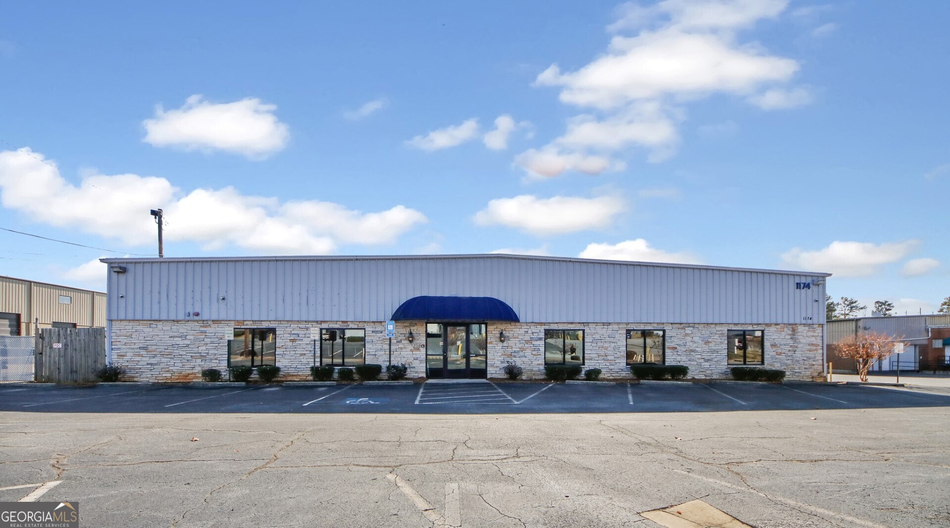 Berkshire Hathaway is pleased to offer this B Class warehouse/office space with over 38,000sf on 1.47 acres is located less than half a mile from I-75 in Marietta and centrally located. Zoned Light Industrial with 13,346 office space and over 24,000 sf warehouse space including 5 loading docks with 3 high doors and 2 drive-indoors. Building height 25a with a clearance height of 24a. Office space includes a conference room, lobby, multiple private offices, ample space for team base layout, break rooms, and several bathrooms w/ showers. Renovated upgrades include (4) 25-ton HVAC units installed in 2019 in the warehouse and (2) HVAC units installed in 2020 in the office area, along with 2000 amps @ 480. Near CSX rail lines and the Georgia Southern Railway Co, LLC for your logistics needs. Great opportunity for an investor or end user.