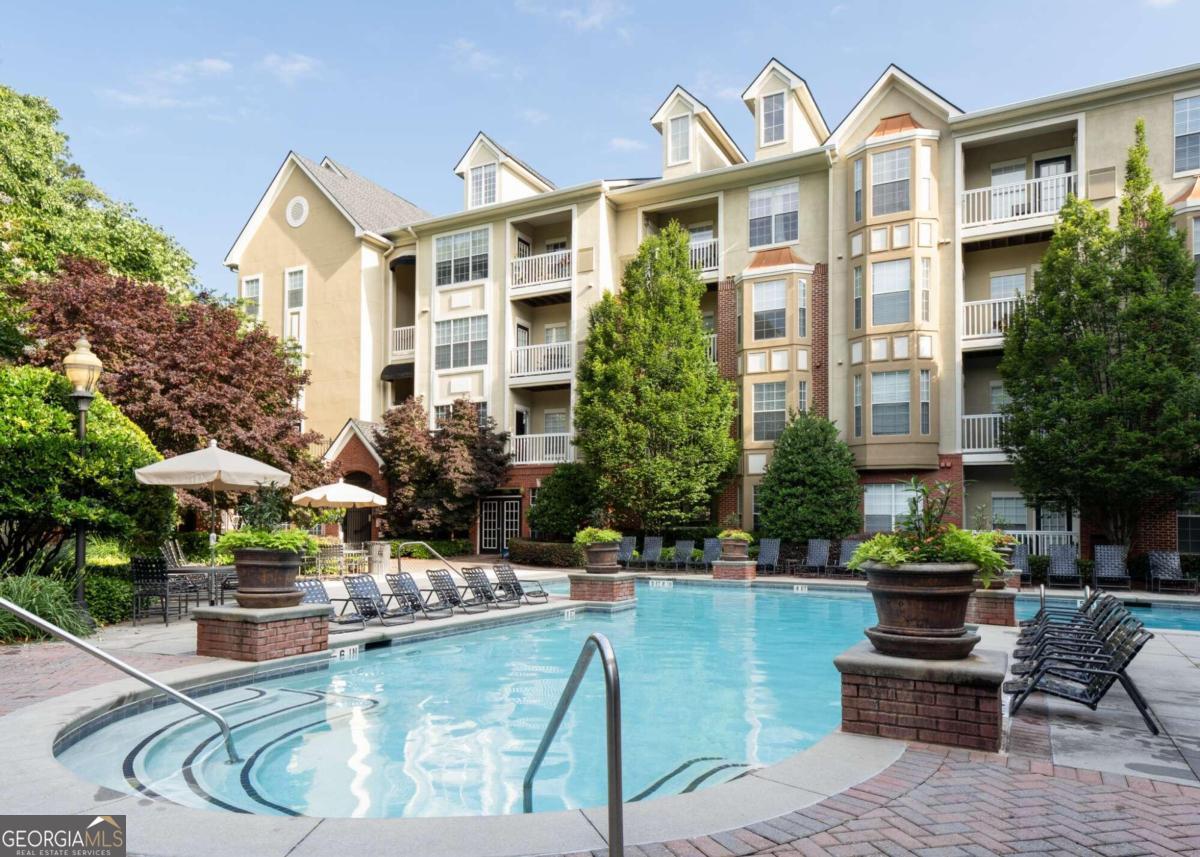 This main level, pool view, condo within the immaculately kept Enclave at Briarcliff is the perfect place to call home. Excellent floor plan includes: two spacious bedrooms w/ walk-in closets, two full baths, separate living/dining rooms, granite counters in kitchen w/ stainless steel appliances, in-unit laundry (washer/dryer included), two reserved spaces in the parking garage, and so much more. The community itself features incredible amenities such as: a resort style swimming pool, tennis court, 2-acre park, car wash center, gym, clubroom, Luxer One digital package delivery, and gated/key card entry. You'll be within walking distance of CHOA's new billion dollar campus, shopping, restaurants, walking trails, and a short drive to Emory. $47 non-refundable application fee per adult tenant. Credit report and Income verification required. Viewings are through appointments only.