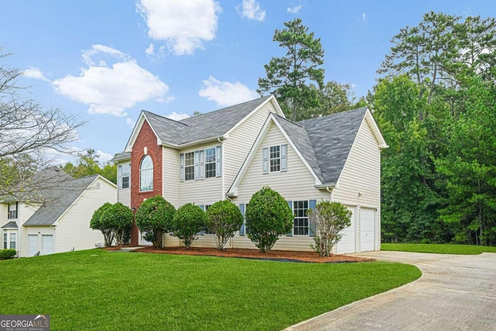 Photo of 9426 Carnes Crossing Circle, Jonesboro, GA 30236 (MLS # 10854567)