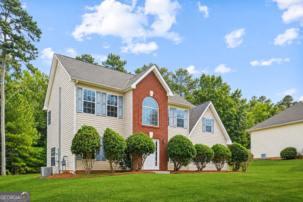 Photo of 9426 Carnes Crossing Circle, Jonesboro, GA 30236 (MLS # 10854567)