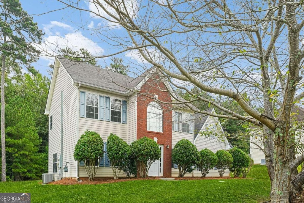 Photo of 9426 Carnes Crossing Circle, Jonesboro, GA 30236 (MLS # 10854567)