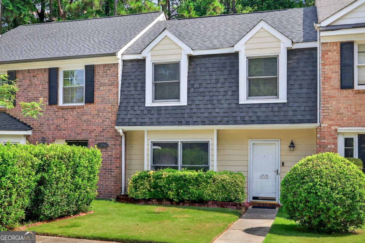 Welcome to this charming recently remodeled townhome in the desirable Twin Brooks community of Marietta! This 2-bedroom, 2-bathroom residence offers a perfect blend of comfort and convenience. Step inside to an inviting living room featuring a cozy fireplace, ideal for relaxing evenings. The updated kitchen provides a welcoming space for meals and gatherings. The primary suite is a private retreat with walk in closets and an en-suite bath with a recently remodeled bathroom. Enjoy the outdoors in your private, level backyard, perfect for entertaining or quiet relaxation. Ample storage throughout, this home offers both practicality and a fantastic location close to Located in the highly coveted I-75 corridor minutes away from interstate, shopping, restaurants, and the Braves stadium. NO HOA and NO RENT RESTRICTIONS. Practical roommate floor plan. Don't miss this opportunity to own a wonderful home in a sought-after neighborhood!