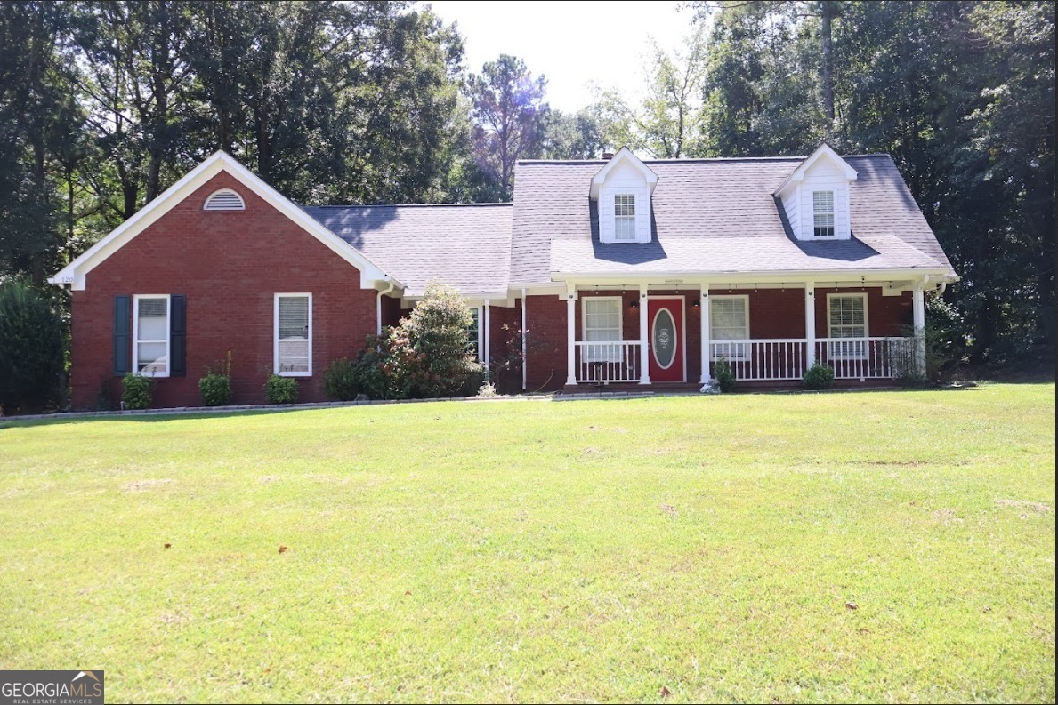 Welcome home to this beautifully updated 3 bed, 2.5 bath Fayetteville brick retreat on 2 acres! The main-level master suite offers a spa-like bath with garden tub and separate shower. Enjoy a cozy fireplace in the family room, granite counters in the kitchen, and brand-new appliances under warranty. With fresh paint, new flooring, new HVAC, and stylish fixtures throughout, it's completely move-in ready. Upstairs, you'll find two spacious bedrooms and an office/flex area. A 2-car garage plus workshop pad adds extra value. Don't miss this perfect blend of comfort and convenience!