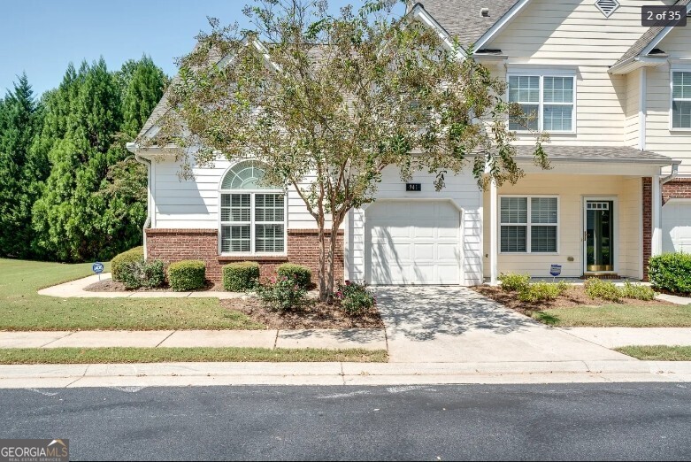 Bright, End-Unit Townhouse in Park-Like Community - Motivated Seller! Enter to a lovely, sunlit end-unit townhouse condominium nestled in a small, serene neighborhood surrounded by greenery. This home has been thoughtfully updated with a brand-new HVAC system, recently installed windows and refreshed bathrooms and lighting fixtures throughout. Enjoy privacy in your fully fenced patio ideal for relaxing outdoors. This residence offers a superb location just minutes from shopping, restaurants and essential services. It features two spacious bedrooms including a main-level master suite along with a flexible open loft area that can serve as an office, hobby room, or guest space. The home includes 2.5 updated bathrooms, all upgraded with high-quality fixtures. The heart of the home is a large, eat-in kitchen equipped with granite countertops, tile flooring and backsplash and a dramatic Palladian window. The adjacent two-story great room and dining area boasts soaring ceilings, elegant crown molding and plenty of natural light creating an air of sophistication and warmth. Additional highlights include newer carpeting in the primary bedroom, extra garage storage and a walk-in safety tub by Sanctuary in the primary bathroom perfect for greater accessibility and peace of mind. The community is conveniently situated within easy driving distance to top-rated hospitals and medical facilities an excellent option for anyone seeking comfort, style and convenience.