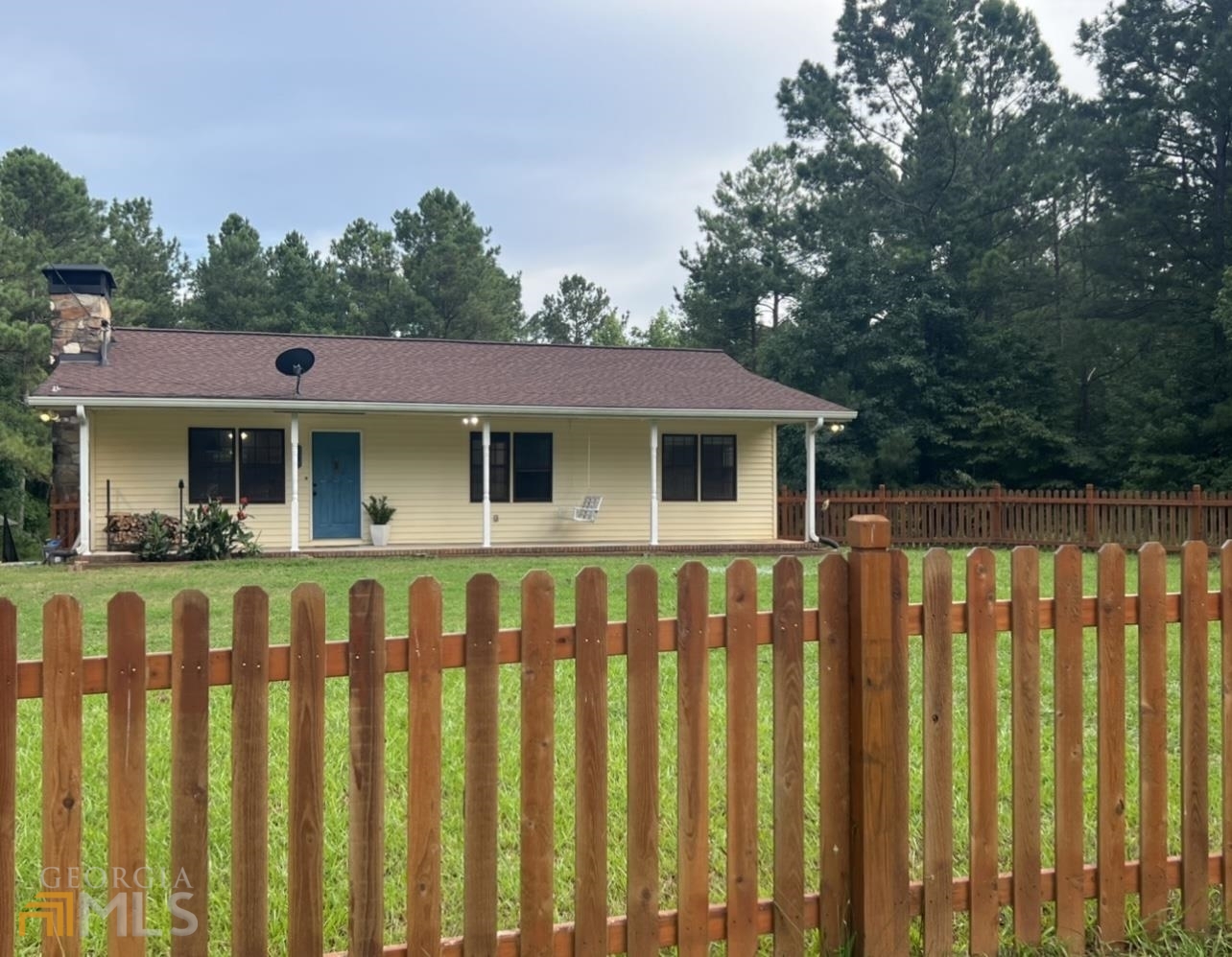 Welcome HOME! This is what you have been looking for, convenient to I-20 but far enough out of “Town” to enjoy the quiet country setting. Grab a glass of sweet tea and sit on the front porch of this Ranch style home with full basement on a level one acre lot. Home has been updated with LVP flooring in kitchen/dining/living room combo and new carpet in the bedrooms. Kitchen has been completely remodeled and boasts beautiful open shelving, stainless steel appliance package and custom butcher block countertops. Living room features a wood burning fireplace but is able to be switched to gas logs if preferred. The owners suite and two additional bedrooms are on the main level along with one additional full bath. In the basement you will find another large living space that would be the perfect man cave, teen hangout or child’s play room. Two additional bedrooms and one full bathroom are also downstairs along with the laundry room. Outside you will find a nice screened in porch to overlook the back yard. Outbuilding will stay. Come and make this place your special retreat! Seller/Agent relationship.