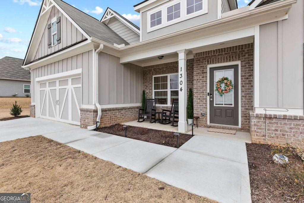 Photo of 1304 Honeysuckle Lane, Hoschton, GA 30548 (MLS # 10669946)