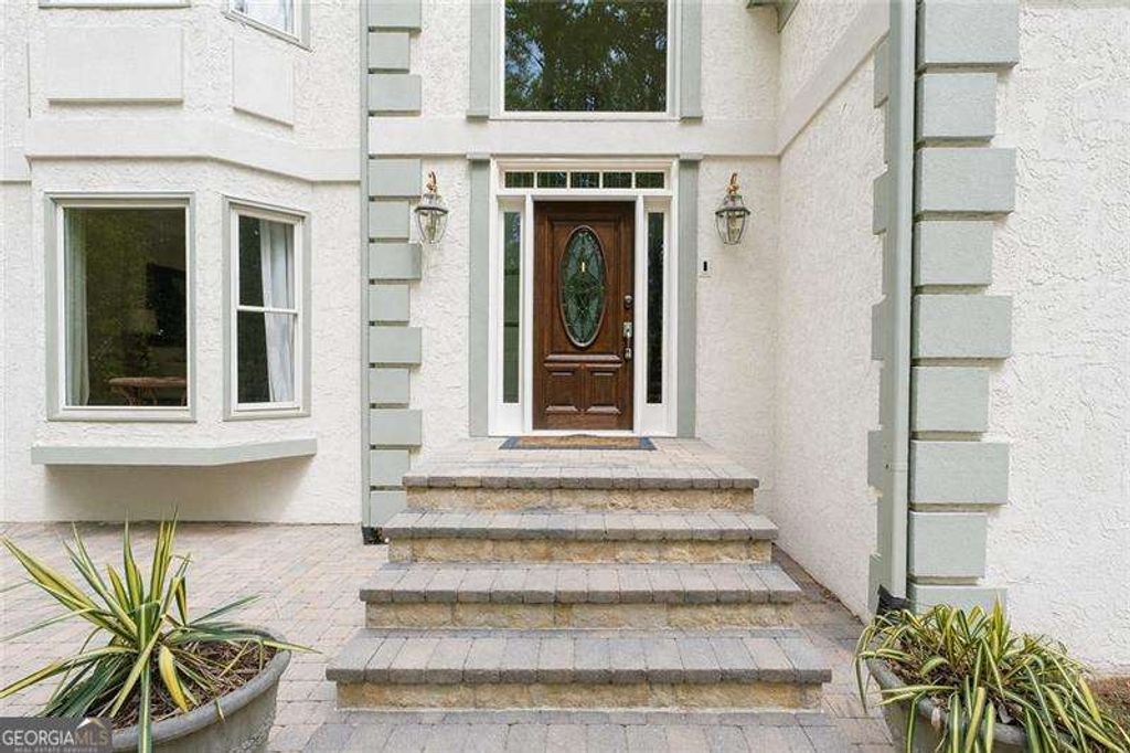 Photo of 9570 Huntcliff Trace, Sandy Springs, GA 30350 (MLS # 10739918)