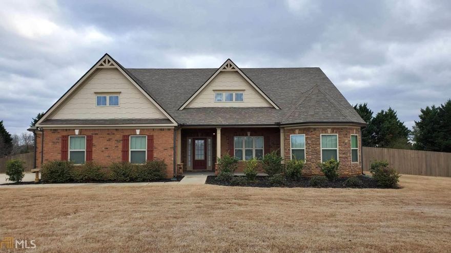 Gorgeous nearly new Ranch home with upgrades throughout. This open concept home features a large formal dining room, great room with corner fireplace chef's kitchen with large eat around island and separate breakfast area, gas cook-top. Owners suite with separate vanities & H/H closets. Secondary bedrooms with Jack 'n Jill bath. Upper level features private 4th bedroom with full bath ideal for guests or teens. 3 Car Side-entry garages maximize curb appeal. Covered patio overlooks a large private fenced backyard.  Centrally located with easy access to Cumming, Dawsonville, Gainesville, and easy access to Lake Lanier.  New East Forsyth High School will be just down the road once completed.