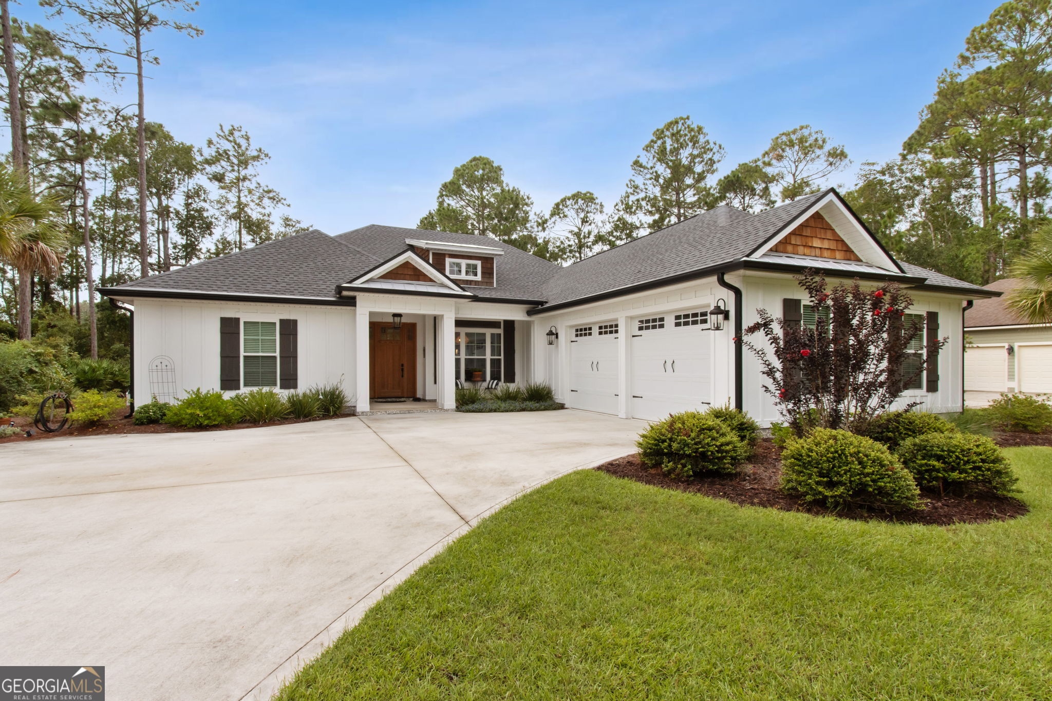 Welcome to this stunning custom-built home by Murrell Construction, offering four bedrooms and three bathrooms in one of Osprey Cove's most desirable locations. Nestled at the end of a private cul-de-sac, this residence combines timeless craftsmanship with modern luxury, creating a home that feels brand new. Inside, you'll find an open floor plan with a chef's kitchen at the heart of the home, perfect for entertaining and everyday living. A dedicated dining room provides an elegant space for gatherings, while the multi-split bedroom design ensures ultimate privacy for family and guests. The extremely large main suite is a true retreat, featuring a spa-like bathroom and an oversized walk-in closet designed to impress. Throughout the home, custom upgrades and high-end finishes showcase thoughtful detail and quality craftsmanship. Step outside to your private oasis-an expansive lanai with fireplace and TV, overlooking a custom pool with complete privacy and serene water views. This property blends elegance, comfort, and privacy both indoors and out, all within the gates of the prestigious Osprey Cove community, known for its world-class amenities and convenient location.
