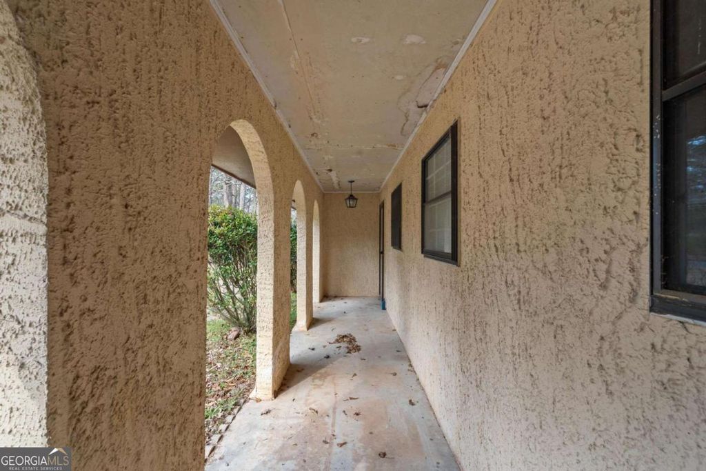 Photo of 5890 Avenue Of Redwoods, Atlanta, GA 30349 (MLS # 10699397)