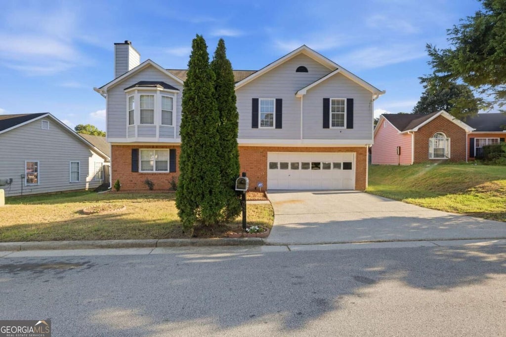 Photo of 5527 Tunbridge Wells Road, Lithonia, GA 30058 (MLS # 10868964)
