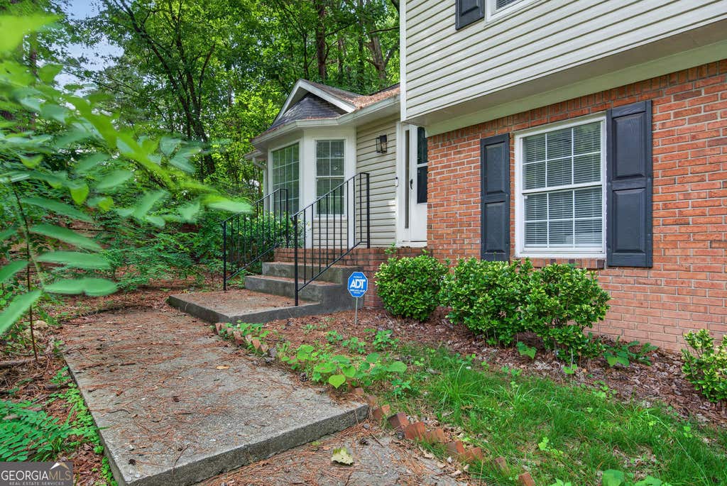 Photo of 2535 Hallie Mill Rd, Atlanta, GA 30349 (MLS # 10822873)