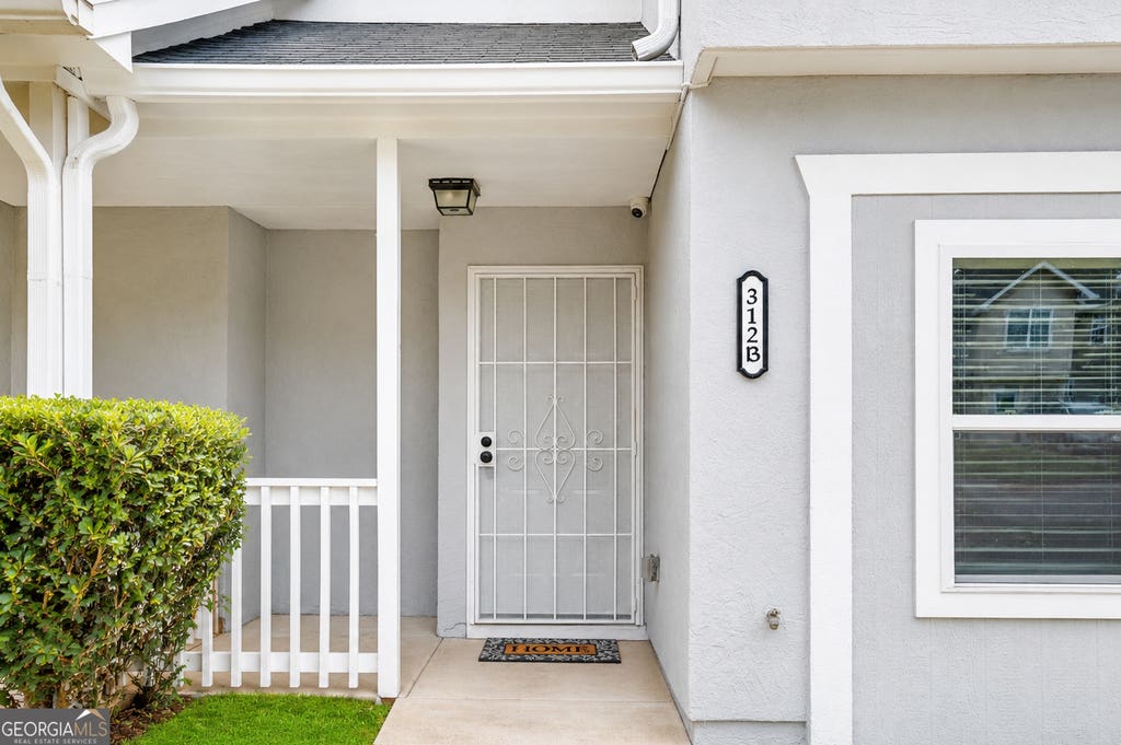 Photo of 312 LOUISE Lane #B, GRIFFIN, GA 30223 (MLS # 10779072)