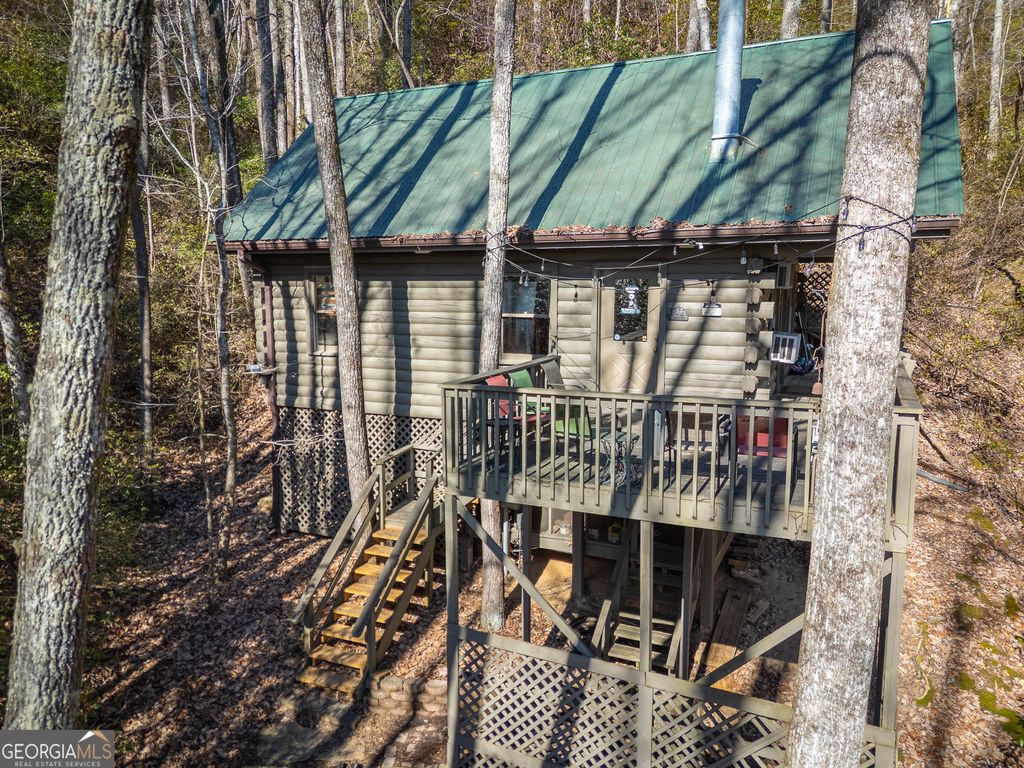 Photo of 85 Squirrel Hollow Dr, Sautee Nacooche, GA 30571 (MLS # 10687582)