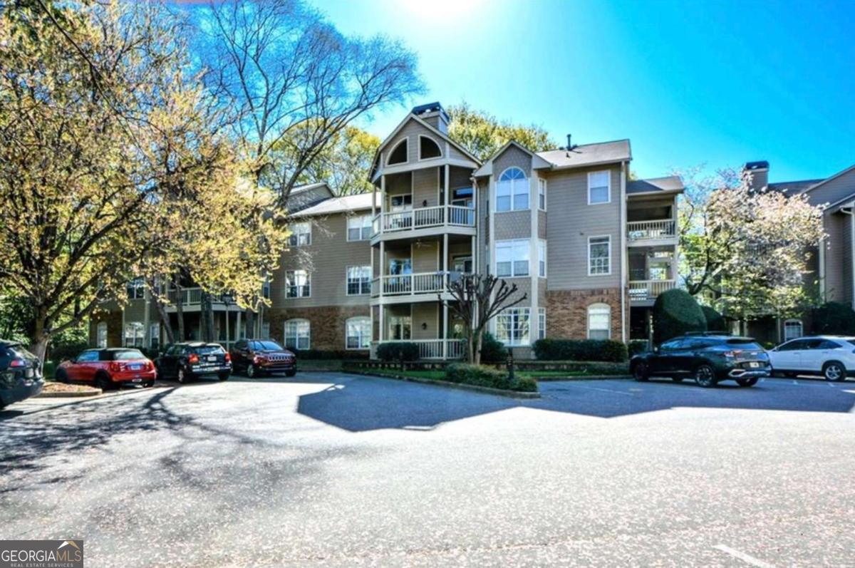OPPORTUNITY ALERT - 2nd floor condo in O4W priced below recent appraisal and comps. Buy in at this price and earn almost 10% instant equity!!! Whether you are looking for a place to call home and/or trying to lower your monthly home ownership costs by renting out an extra BR to a friend or tenant, this is your chance to do so at a great price. Welcome home to this centrally located 2BR/2BA condo in Atlanta's Old Fourth Ward! Situated within a gated community filled with amenities (pool, gym, clubhouse, EV charging stations, etc.), this is the urban oasis you have been waiting for. As you walk into this 2nd-floor unit, you will be drawn to the beautiful hardwood floors found in the foyer and throughout the home, including both bedrooms! The primary bedroom is the first room off the foyer, featuring bay windows, a tray ceiling, access to an outdoor balcony, and an alluring renovated ensuite bathroom equipped with a stand-up shower, bathtub, and a walk-in closet. In the primary living area, you will find an open floor plan that features a spacious living room with a fireplace, and access to an outdoor balcony overlooking a peaceful and scenic courtyard where you can sit back, relax and sip your morning coffee. Behind the living room is the dining area and an updated kitchen which features a breakfast bar, granite countertops, a tile backsplash, and stainless steel appliances, ideal for cooking and entertaining. Tucked away off the kitchen is a utility room with a full-sized washer and dryer. On the other side of the living room, you will find a separate wing with a secondary bedroom and another full bath, perfect for a roommate, guests, or a home office. Combine all of this with the home's proximity to public transportation (MARTA), major freeways (85/75/20), access to greenspace (Beltline) and various shopping and dining options including Ponce City Market, and you've found yourself a true gem in 1315 McGill Park! Take advantage of this incredible opportunity with equity built into the deal and schedule your showing today! SELLER IS MOTIVATED!