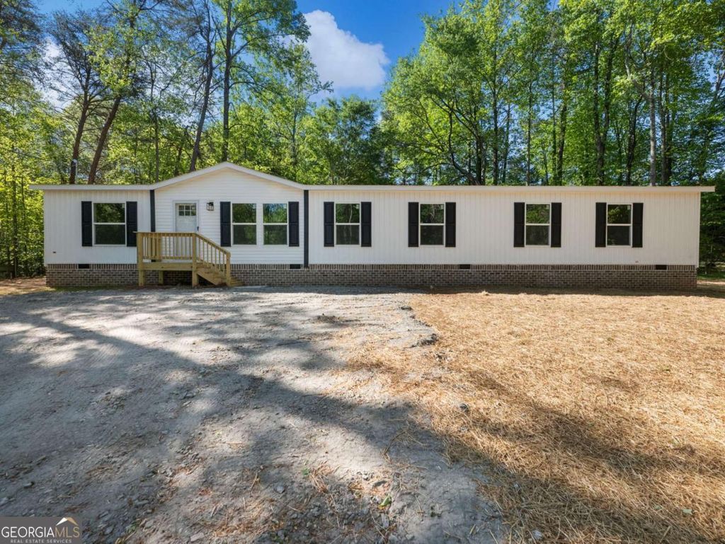 Photo of 3037 Fowler Road, Gainesville, GA 30501 (MLS # 10740046)