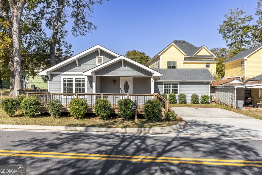 Buford City Schools! No HOA. Welcome to this charming bungalow home in the heart of Downtown. Featuring 3 spacious bedrooms and 3 full bathrooms. It is within easy walking distance to all the restaurants, shops, parks, and community events. This home was renovated in 2017 with the addition of a mud room, master bedroom, and en suite bathroom with a walk in closet, new kitchen and a large dining area. This single family home features a low- maintenance yard, allowing more time to be spent on family activities and entertainment.