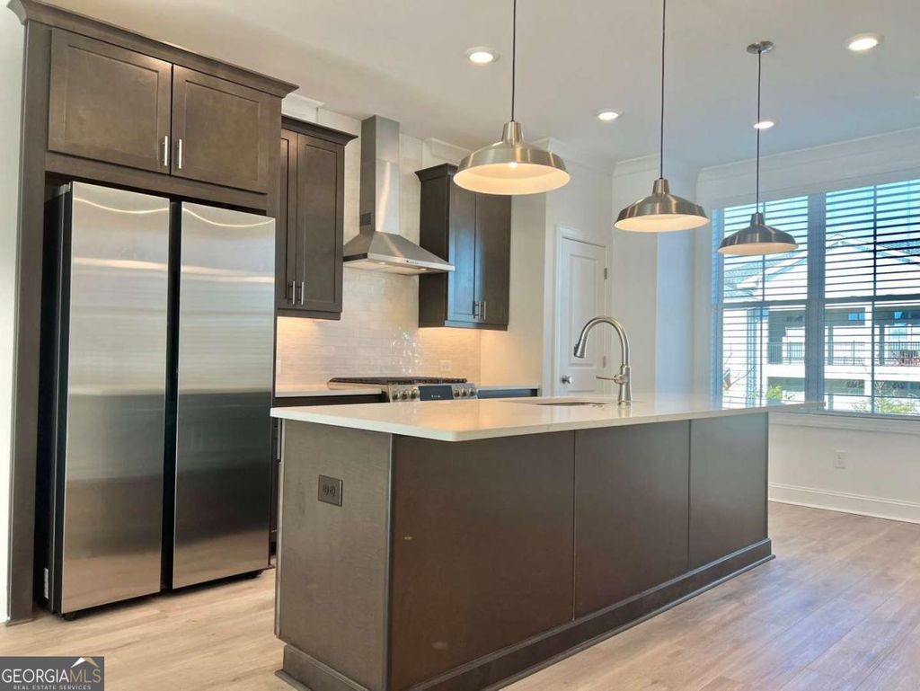 Photo of 617 Millcroft Boulevard, Buford, GA 30518 (MLS # 10700366)