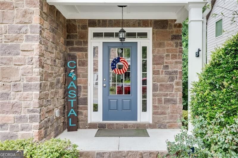 Photo of 6896 Big Sky Drive, Flowery Branch, GA 30542 (MLS # 10839973)