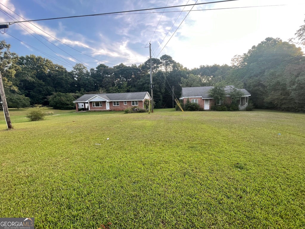 Photo of 541 Highway 18 W, Barnesville, GA 30204 (MLS # 10838741)