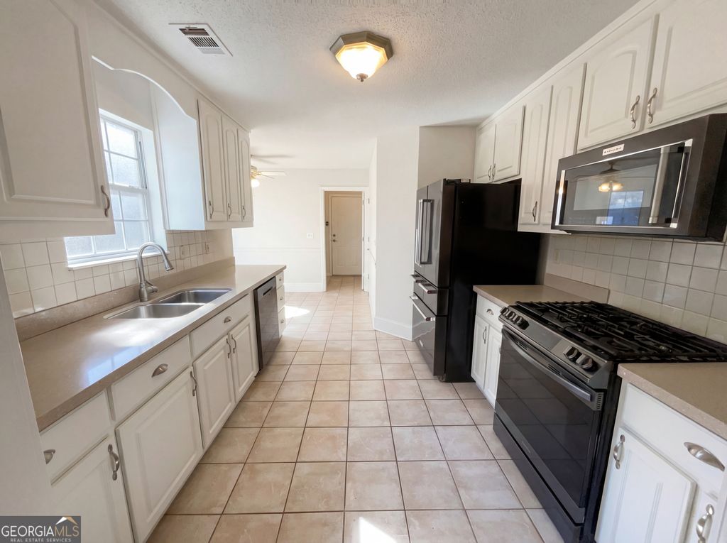 Photo of 165 Christian Woods Drive, Conyers, GA 30013 (MLS # 10693387)