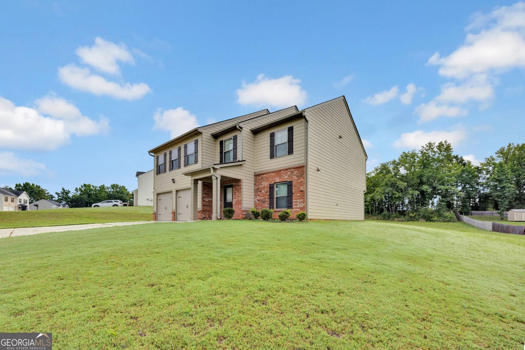 Photo of 145 Chapel Heights Way, Covington, GA 30016 (MLS # 10812190)