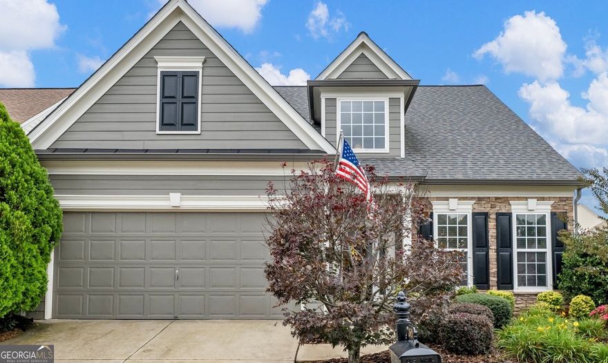 If you want in HOT South Forsyth, this is the place to be! Pristine property with all the bells and whistles in one of the most LOVED communities Peachtree Court. Peacefully tucked away on a cul-de-sac street this home is a rare find with an exquisitely landscaped and fully fenced backyard. Only the 2nd owners to cherish this lovely home and it shows. You'll be pleasantly greeted by the stunning curb appeal and covered porch. Grand 2-story foyer upon entering accents the perfect home office or could be your play room, music room or library. As the largest plan in the community you are destined to love and appreciate the open flow. From the gorgeously remodeled kitchen overlooking the inviting fireside family room to the enclosed porch nestled off the family room, you are sure to enjoy relaxing and taking in the ambiance of the private yard. Professional designer updates include beautiful kitchen remodel with granite countertops, lux stainless appliances including vent hood, custom farmhouse inspired shelving with an industrial flare and gorgeous counter to ceiling tile backsplash. The kitchen also offers 2 pantries, coffee bar area, island with breakfast bar and eat-in dining. Comfort living at its best, this home lives like a ranch but offers a second story for an array of lifestyles. Serene owner's suite on main level as well as a secondary bedroom with private bath providing all the one level living you could want. Upstairs is nice sized bedroom, private bath and HUGE loft space currently used as a bedroom/secondary living spcae. Loft can easily and economically be converted to an enclosed bedroom for immediate upside value. Let your imagination run free as you customize this space to fit your desired media room, second master suite, gym or just a flex bonus. Move right in worry free because these owners have taken care of all the majors! NEW roof and gutters, new HVAC, brand new carpet (scheduled to be installed 10/23) and entire exterior painted within the last couple of years. Awesome walk-in closets in every room in addition to the owners customizing the walk-in attic to graciously maximize storage. You can't help but to feel the joy and pride that makes this house a home. Community offer swimming pool, clubhouse and dog park. Conveniently located to GA 400, The Collection at Forsyth, quick to Avalon and Halcyon, tons of restaurants and shopping along with top ranked highly sought after schools. 3 Lake Lanier Parks within 15-20 mins. This truly is a special find!