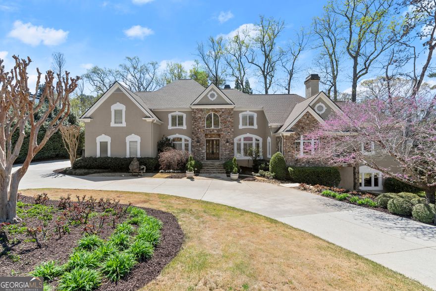 Don't miss this exceptional opportunity to own a stunning estate in the highly sought-after Atlanta Country Club, just a short walk from the club and McFarland Park. Designed for both everyday comfort and grand entertaining, this exquisite home features a walk-out main level saltwater pool, a cascading waterfall spa, and a beautifully finished daylight terrace level complete with a media area, temperature-controlled wine cellar, expansive recreation room, and full bar with stunning quartz countertops, a refrigerator, sink, ice maker, and dishwasher.    This stunning home boasts an open, inviting layout perfect for large families and guests. The chefCOs kitchen is a masterpiece, featuring white cabinetry, a spacious island, a walk-in pantry, new quartz countertops, a Sub-Zero refrigerator, and top-tier stainless steel appliances. Overlooking the private pool and spa, the keeping room and kitchen seamlessly blend indoor and outdoor living. Recent enhancements include new hardwood floors in the kitchen and entryway, a new grilling deck and screened porch with high end trex decking, and terrace-level patio, expanding outdoor entertaining possibilities. The banquet-sized dining room comfortably seats 12 or more, making it ideal for hosting unforgettable gatherings.    The main-level OwnerCOs Suite is a private sanctuary, featuring a marble fireplace, a cozy sitting area with a custom vaulted ceiling, a spa-like bath with a steam shower and soaking tub, custom His & Hers closets, and a private laundry room. Upstairs, a second primary suite with a newly remodeled bath (completed this week) is accompanied by three additional bedrooms, three full baths, and a versatile bonus/playroom/office. The newly finished sixth bedroom on the terrace level includes a walk-in closet and access to a full bath.    Additional features include two large offices on the main level, a new roof installed in 2023, fresh interior paint in 2024, and exterior paint updated in 2021. A whole-house water filtration system ensures premium water quality, while three gas fireplaces add warmth and character. The home offers abundant storage throughout, including oversized walk-in closets, and a second laundry room upstairs for added convenience.    Situated on a .71-acre lot with professional landscaping, this home provides ample space and privacy. Located on the club side of the neighborhood, where power lines are buried to reduce outages, it is also zoned for top-rated Sope Creek Elementary, Dickerson Middle, and Walton High School.    A rare opportunity to own a home that blends luxury, comfort, and an unbeatable locationCoschedule your private tour today!