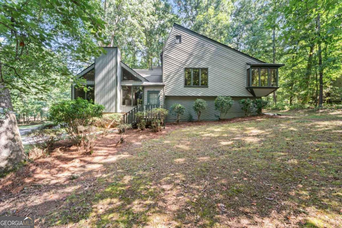 Completely renovated 4 bed/3 bath home in Marietta with full basement! BRAND NEW ROOF, ALL NEW KITCHEN CABINETS, GRANITE COUNTERTOPS, LVP FLOORING, PAINT, STAINLESS STEEL APPLIANCES, VANITIES, SHOWERS, LIGHTS, SWITCHES, OUTLETS, FANS, TOILETS - ALL BRAND NEW! Master suite with new vanity, shower, walk in closets! Fully finished basement has an in-law suite with full kitchen, bedroom, full bathroom and living room! HUGE screened in porch! Corner lot with private yard! Come see before its too late! This one wont last long!