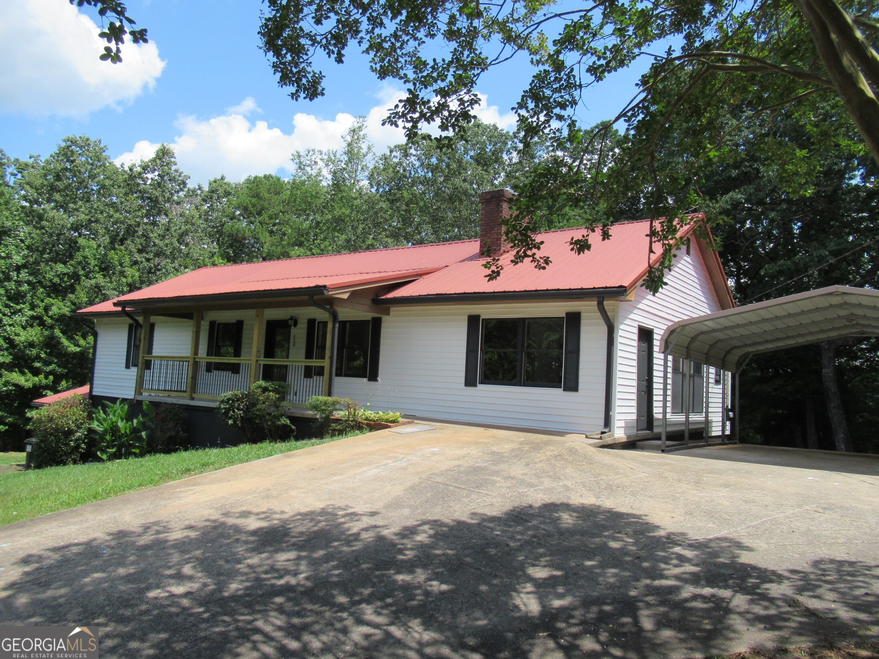 Fall in love with this completely remodeled charming home. The main living area comes with 3 bedrooms and 2 full baths. The primary bath offer seperate garden tub & rain showe while the second bath has double vanity, & rain shower. Great room has cathedral ceiling with fireplace gas log for large gatherings or cozy up in the sunroom. Laundry room is spaciou and is a walk in pantry. Kitchen pops with the granite counter tops and stainless steel appliances while enjoying the eat in bar. All new plumbing, electrical, paint, lighting, doors, flooring and siding like having a new house. The finished basement can be an excellent in law suite or income producing rental apartment. It has a full kitchen, laundry area, dining area, living area, large bedroom and full private bath. Wonderful private side porch to enjoy. Private interior and exterior entrance and driveway. Great opportunity with combination of size, acreage and proximity to downtown Dahlonega. Tucked away in the corner gives privacy on this 2+ acre lot but yet minutes to downtown Dahlonega.