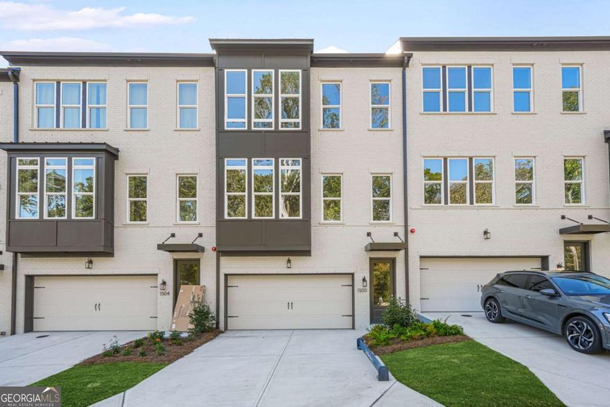 LOCATION, LOCATION LOCATION! Welcome to your new home! This stunning three-level townhouse is the epitome of modern living, perfectly blending comfort, style, and convenience. Conveniently located just a walking distance from the Suntrust Park with easy access to I-75 and I-285. Nestled in a desirable neighborhood, this property is ideal for families, professionals, or anyone looking for a serene retreat, with easy access to city amenities. Three Generous Bedrooms: Each bedroom is designed with your comfort in mind, offering ample space, natural light, and closet storage. The master suite is a true sanctuary, complete with an en-suite full bathroom for ultimate privacy and relaxation. Three Full Bathrooms + Guest Bathroom: No more morning rush hour woes! With three well-appointed bathrooms and an additional guest bathroom on the main level, everyone in your household will have their own space to unwind and prepare for the day. Gourmet Kitchen: Your culinary dreams come to life in this chef-inspired kitchen, featuring a large quartz countertop that provides both functionality and elegance. Perfect for entertaining, this kitchen is equipped with modern appliances and plenty of cabinet space, making meal prep a breeze. The main floor boasts a bright and airy open-concept living and dining area, ideal for hosting gatherings or cozy nights in. Large windows illuminate the space with natural light, enhancing the warmth and inviting ambiance. Step outside onto your large rear deck, the perfect outdoor oasis! Whether you're sipping your morning coffee, hosting a summer barbecue, or enjoying a quiet evening under the stars, this space is designed for relaxation and enjoyment. The fully finished basement/lower level provides an additional family room that's perfect for movie nights, game days, office space, or a children's play area. With direct access to a full bathroom, this space truly adds versatility to your living arrangement. Say goodbye to clutter! The two-car garage not only provides secure parking but also includes generous storage spaces for all your seasonal items, sports gear, and hobbies. Situated in a vibrant community, you'll enjoy proximity to top-rated schools, parks, shopping centers, and dining options. Quick access to major highways makes commuting a breeze, ensuring you're never far from the bustling city life while having the comfort of suburban living. This townhouse is not just a place to live; it's an experience waiting to happen! With its blend of thoughtful design, ample space, and modern conveniences, it's truly a place you'll be proud to call home. Schedule a viewing today to discover all that this exceptional property has to offer!