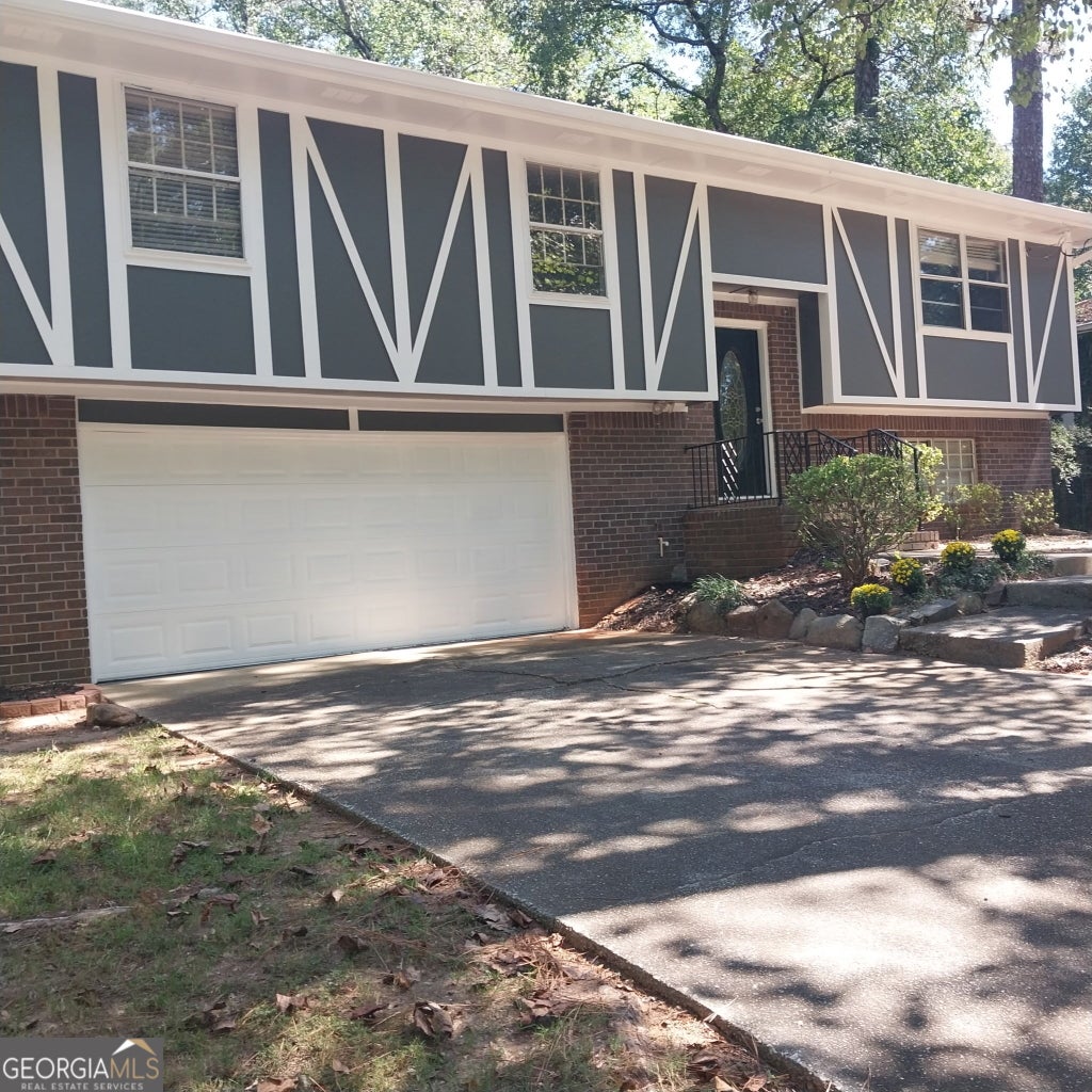Photo of 401 Pineburr Lane, Stone Mountain, GA 30087 (MLS # 10867541)