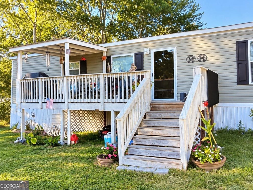 Photo of 5973 Lights Ferry Road #36, Flowery Branch, GA 30542 (MLS # 10856118)