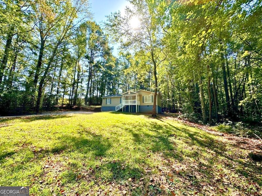 This well-maintained home offers 3 bedrooms, 2 bathrooms, a spacious backyard, and a functional split floor plan designed for comfort and privacy. Step inside to a warm and welcoming living room, where the vaulted ceiling creates an airy, open feel while still maintaining a sense of coziness. The kitchen provides efficient use of space and easy access to the main living areas. One of the home's true highlights is the backyard-spacious, private, and ready to be enjoyed. Whether it's weekend barbecues, morning coffee in the fresh air, or simply a quiet moment surrounded by nature, this outdoor space feels like an extension of the home's welcoming spirit.