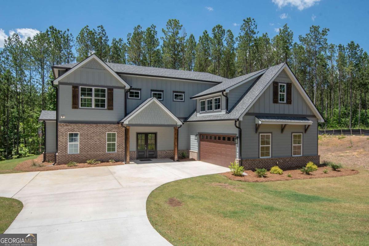 Welcome Home!! Are you looking for a new construction home on the Lake? Come check out this new construction (Scenic Solitude Plan) right on West Point Lake! In the highly sought after Retreat on West Point Lake Subdivision! Personal boat slip comes with the home! The community offers high end covered boat docks for the residence! Just a short golf cart ride or walk to get to them! Open floor plan with master on main, great for entertaining and lake living. 2 additional bedrooms upstairs, media room, Gourmet kitchen features custom cabinets, granite & Stainless steel appliances! It also has an island overlooking large living room and Covered back porch. Oversized front and back covered porches, perfect for entertaining on the weekends or year round living. This is a private corner lot! The Retreat is an upscale & private lake home community that has endless amenities with gated entrances that you just have to see! Walking & Hiking trails look like they belong in story books! Play Area/Picnic area Coming Soon!Closing Cost incentives are being offered at this time as well and a FREE golf cart! Call the listing agent for additional info on lots, plans, and features of Retreat!