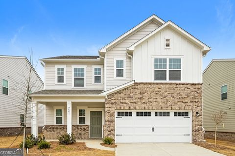 Photo of 7661 Saffron Avenue, Covington, GA 30014 (MLS # 10693041)