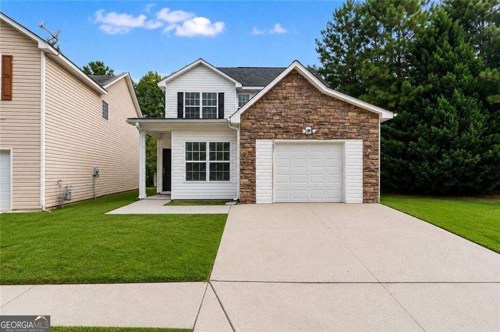 Photo of 2407 Hackamore Drive, South Fulton, GA 30349 (MLS # 10875051)
