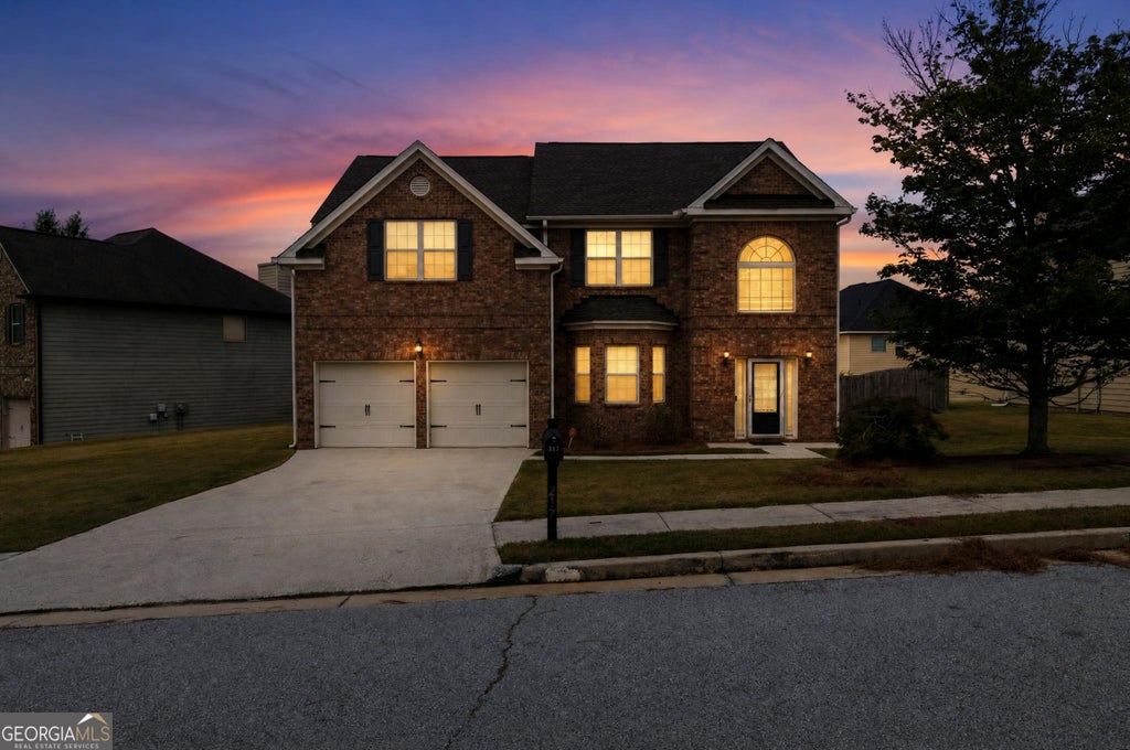 Photo of 217 Saintvry Path, Atlanta, GA 30349 (MLS # 10842241)