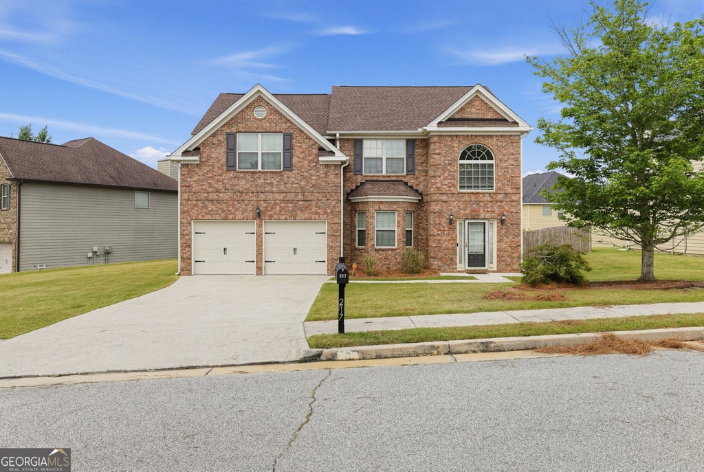 Photo of 217 Saintvry Path, Atlanta, GA 30349 (MLS # 10842241)