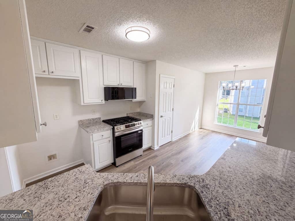 Photo of 1088 Meadow Glen Circle, Fairburn, GA 30213 (MLS # 10833368)