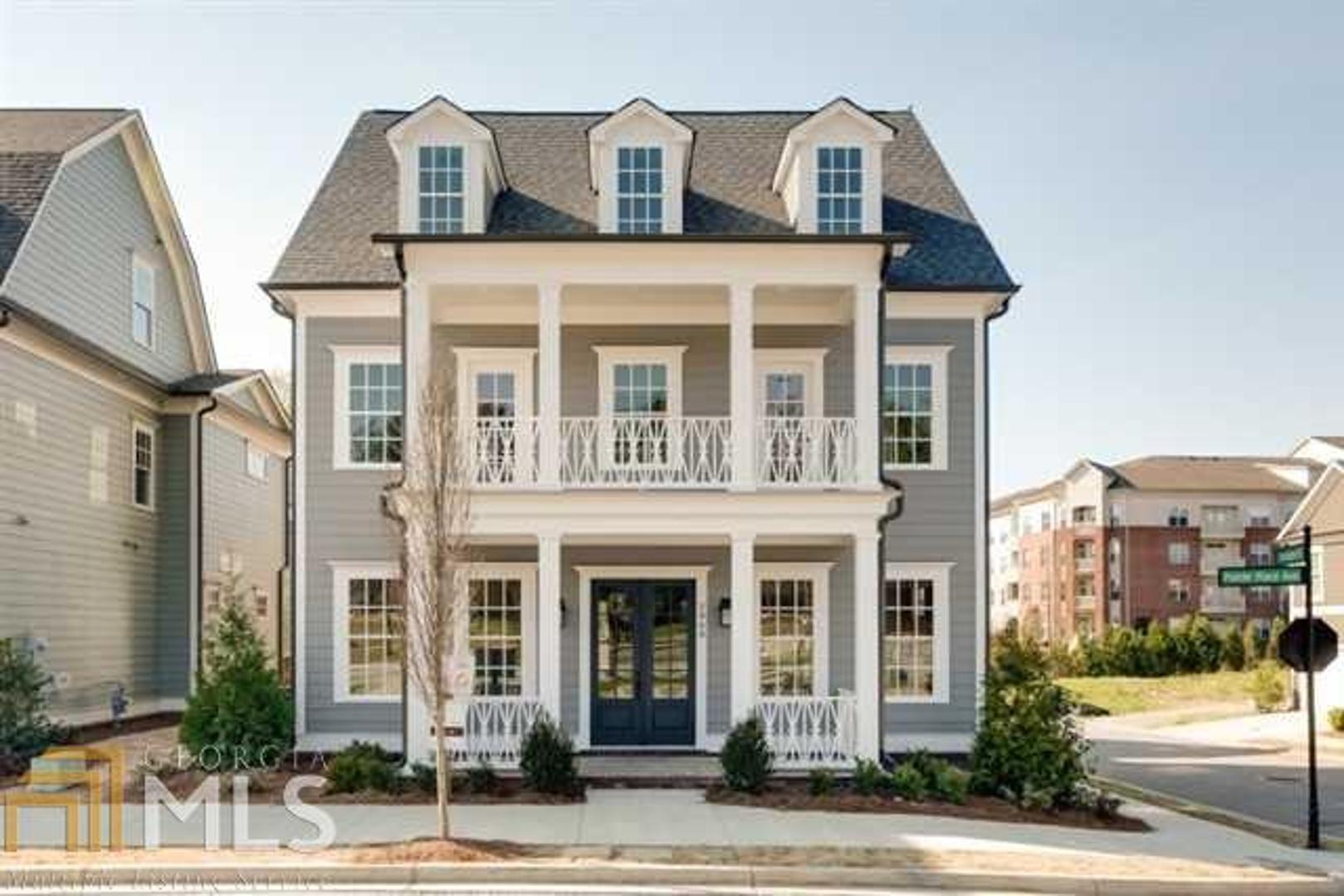 Southern charm w/dbl front porches & sweeping curved staircase as you enter this home. Faces Georgetown Park; Int.offers today's modern conveniences! 1st fl guest ste w/full ba; lrg banquet-sized DR; gourmet kit/state of the art ss appliances; custom cabinetry; Perf for entertaining; view of fireside fam rm & custom built-ins; 10'ceil on main; mudrm accesses detached garage; fin bonus above w/full ba. 2nd lvl has 2 addl BRs w/full ba; loft area; owner ste w/spa ba & walk-in closets. 3rd lvl has media rm/full ba & lrg BR. Home has it all-ready for personal selections!