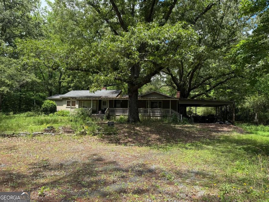 Location, Location, Location!!  9.7 Acres in heart of West Cobb, close to everything...Perfect for large private estate, large estate with guest house or divide into 4-5 large estate lots for small intimate private community...No rezoning required to do any of that. Boundary survey in documents, seller's disclosure and lead paint disclosures in documents...home on property is vacant and not habitable...if visit property please do not enter the home, it would have to be completely redone / almost rebuilt to live in...value is in the acreage in the heart of West Cobb...rare find of this kind of acreage in this part of Cobb County...1-2 minutes from Kennesaw National Park...shopping in every direction...convenient to most anything...call to get access to coded lock at gate on front of gravel drive.