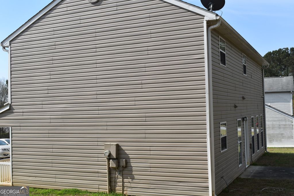 Photo of 1098 Village Creek, Jonesboro, GA 30238 (MLS # 10716358)