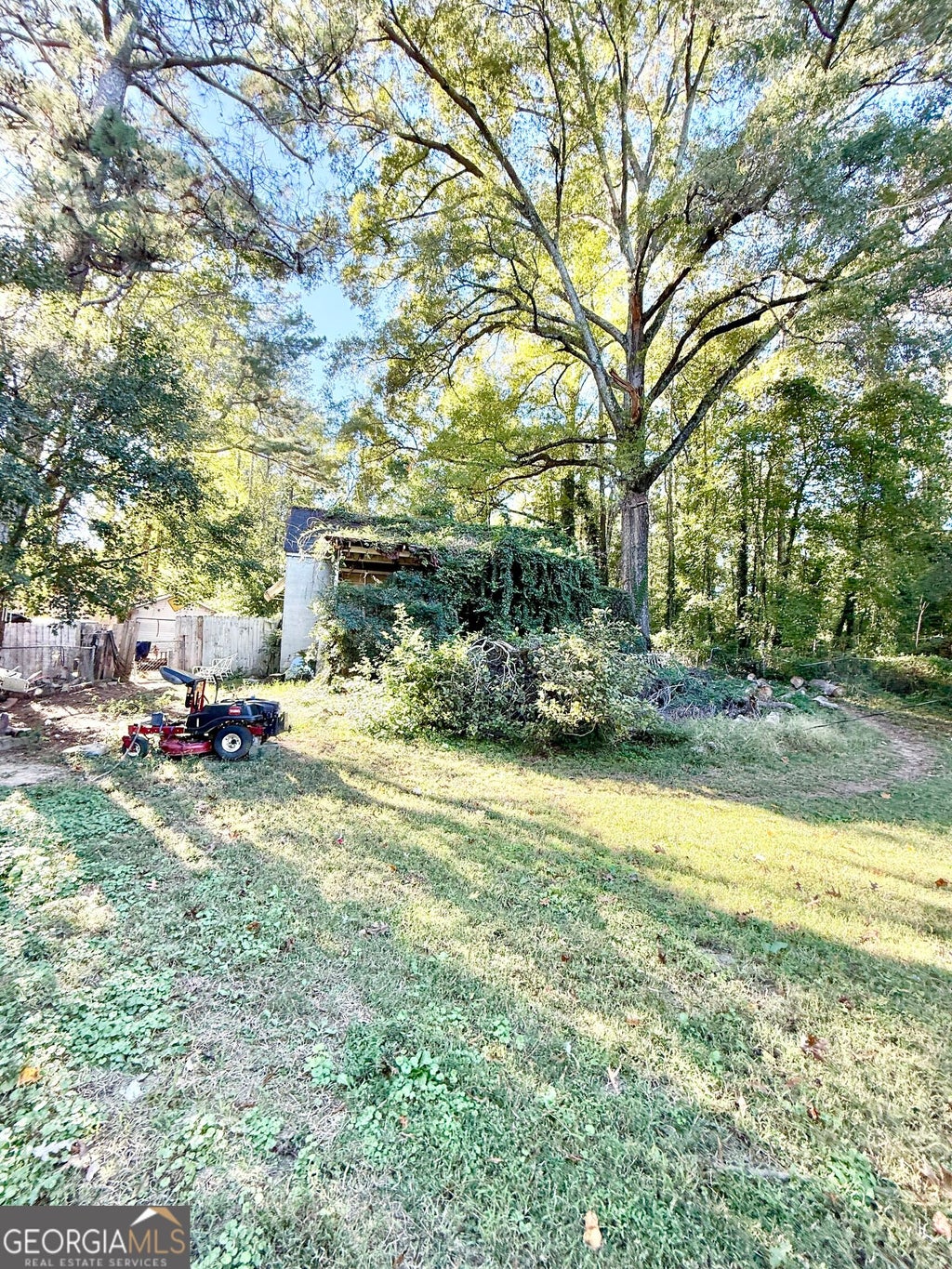 Photo of 5596 Lakeside Drive, Union City, GA 30291 (MLS # 10874951)
